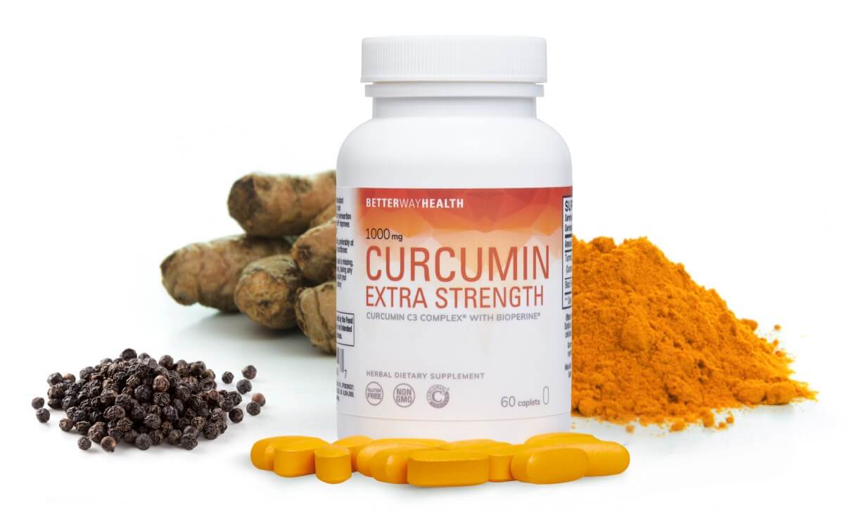 Curcumin Bottle With Ingredients Laid Out